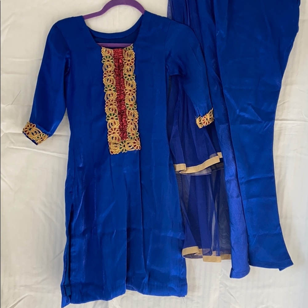 Bold blue tunic and tights with scarf